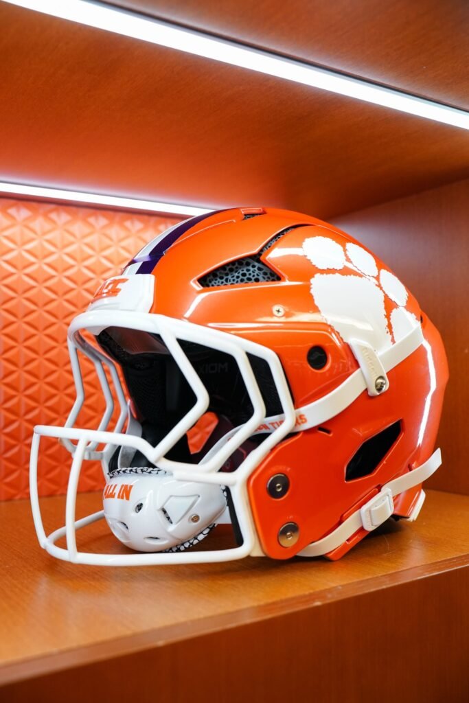 Clemson helmet in a locker room display for the Palmetto Bowl game-day guide